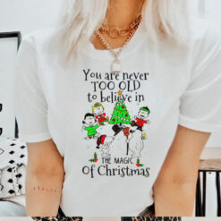 Snoopy and Snowman you never too old to believe in the magic of Christmas shirt