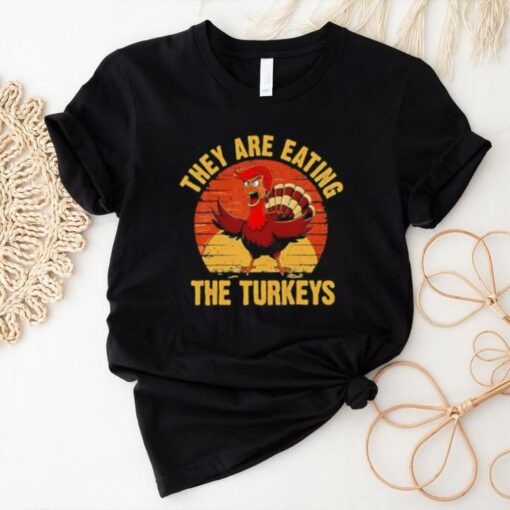 They are eating the turkeys Christmas thanksgiving shirt